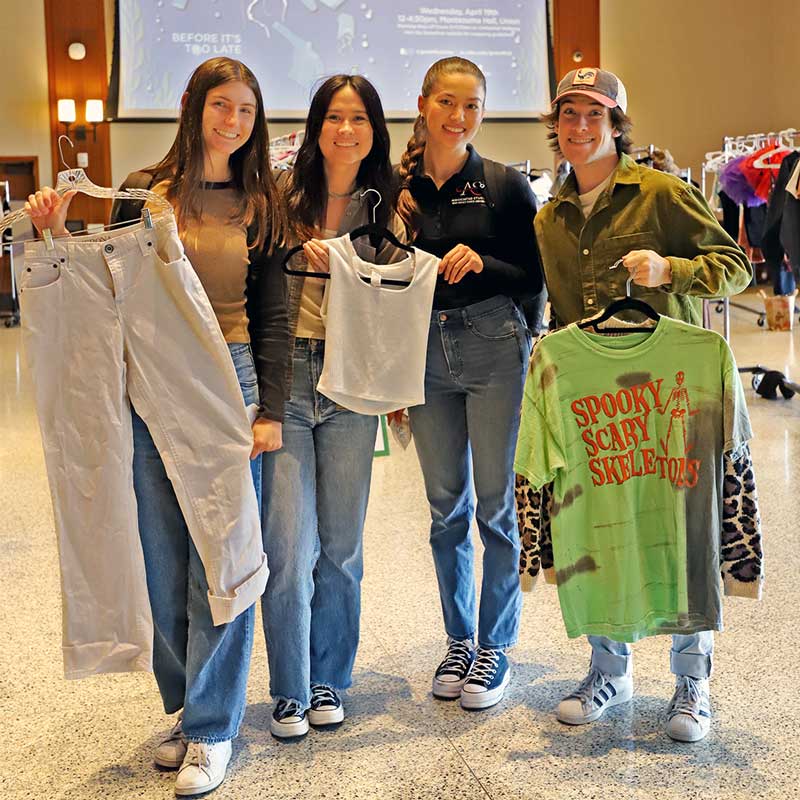 Students picking clothes at Swap Shop