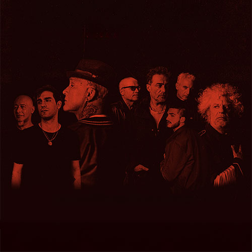  Los Fabulosos Cadillacs members in red on black background  - Event