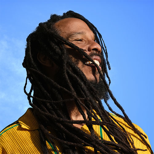  Smiling Ziggy Marley against the sky background  - Event