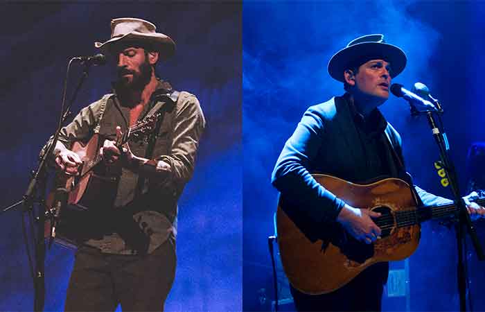 Ray LaMontagne & Gregory Alan Isakov on stage playing guitar Photo
