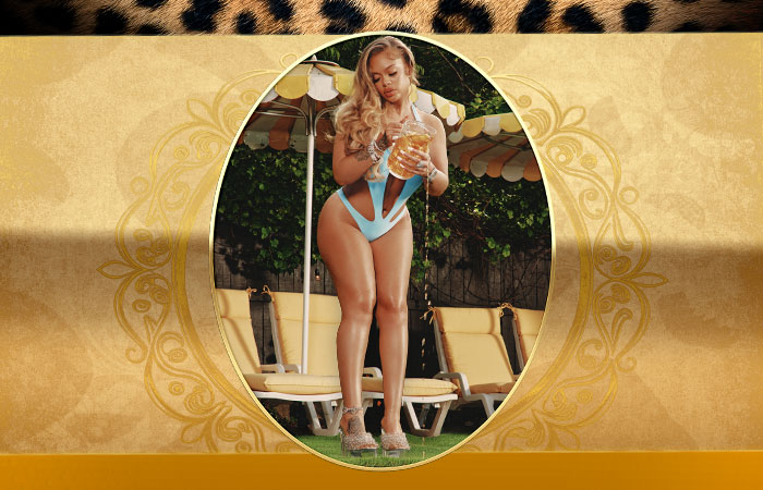 Latto in swimsuit, cheetah print, decorative frame - concert promotional artwork Photo