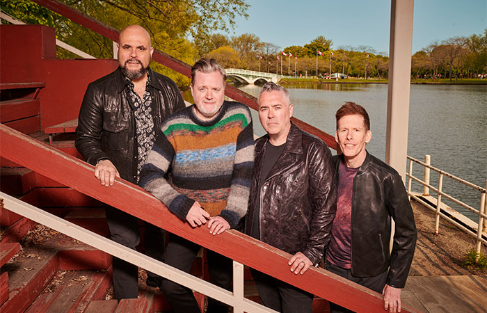 Barenaked Ladies members standing on dock stairs Promotional Photo