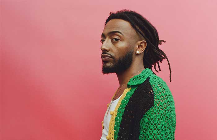 Amine profile photo against pink background Promotional Photo