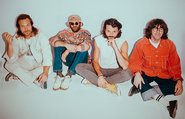Goose band members sitting on the floor  Promotional Photo