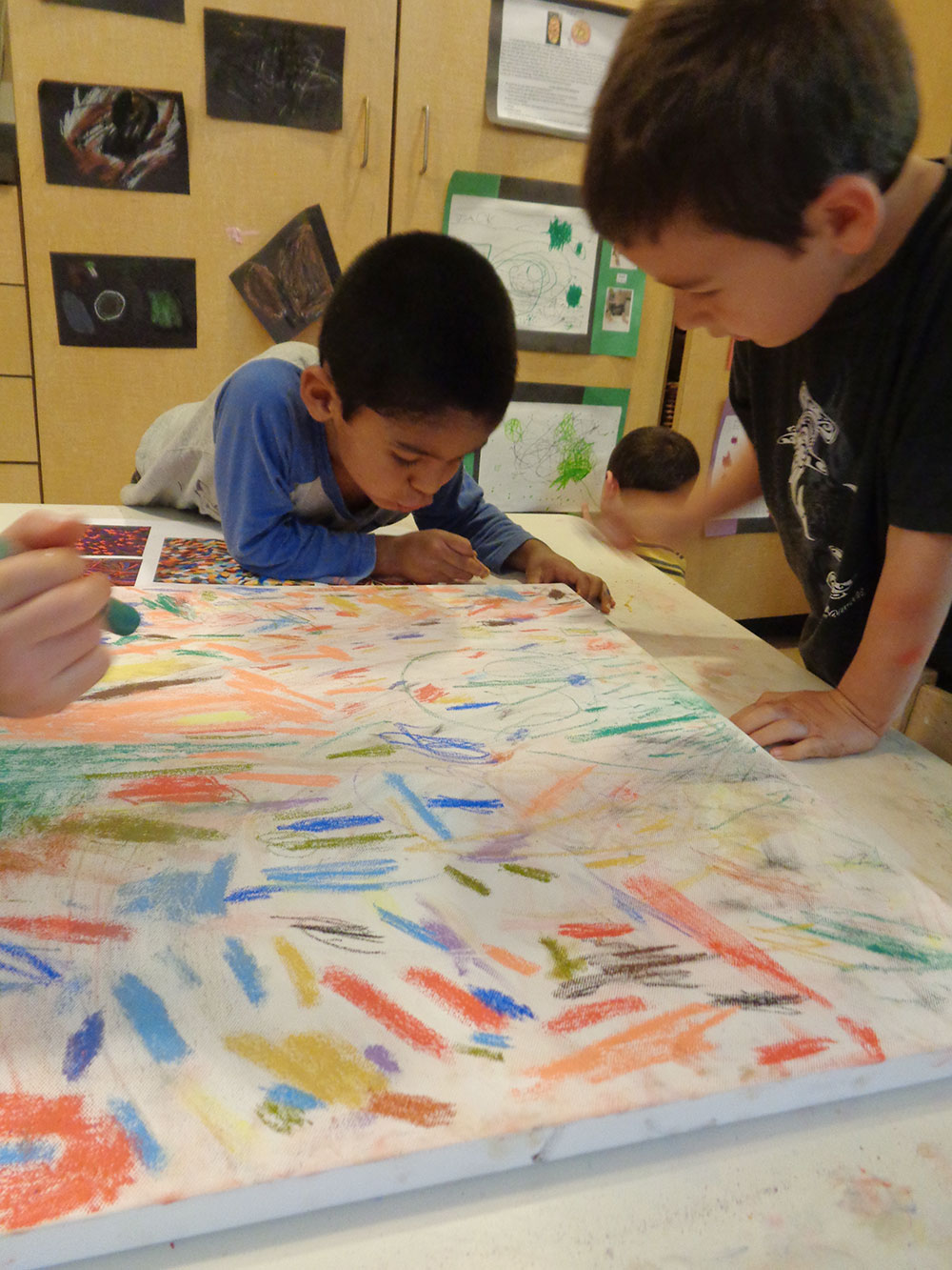Children creating a painting for A is for Art