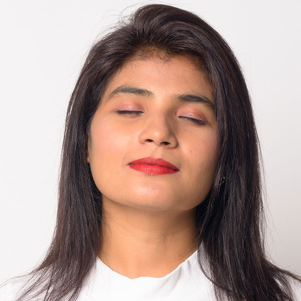 Photo of a woman with her eyes closed