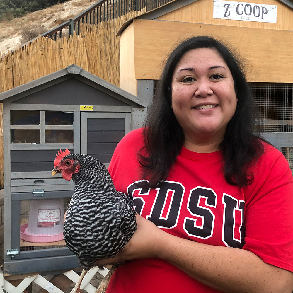 Michelle holding a chicken