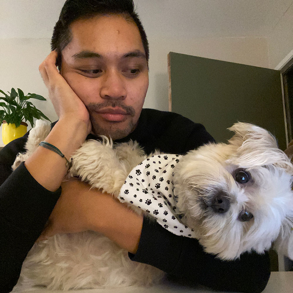 Antonio and his dog, Milo.