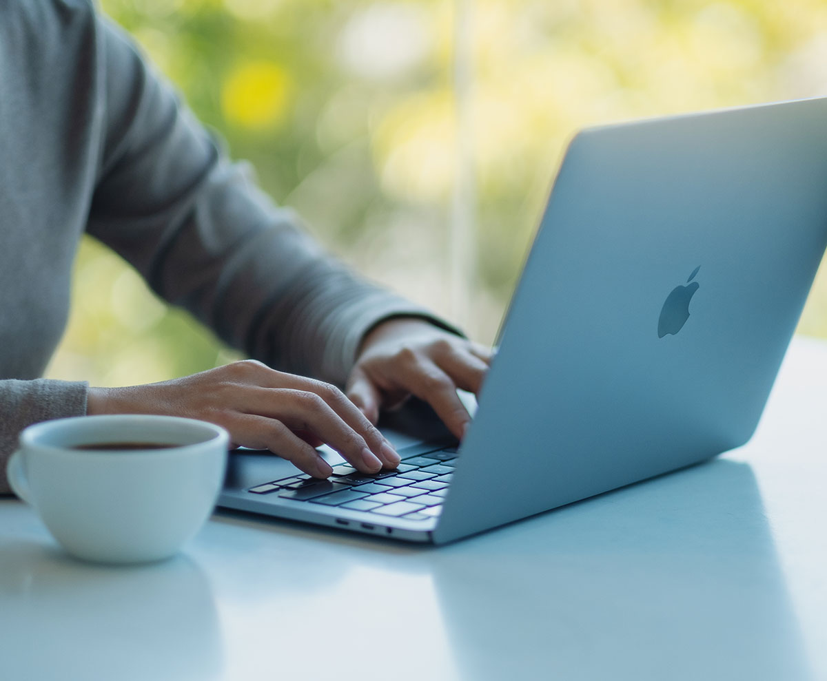 Person using an Apple Computer laptop.?2024-09-29