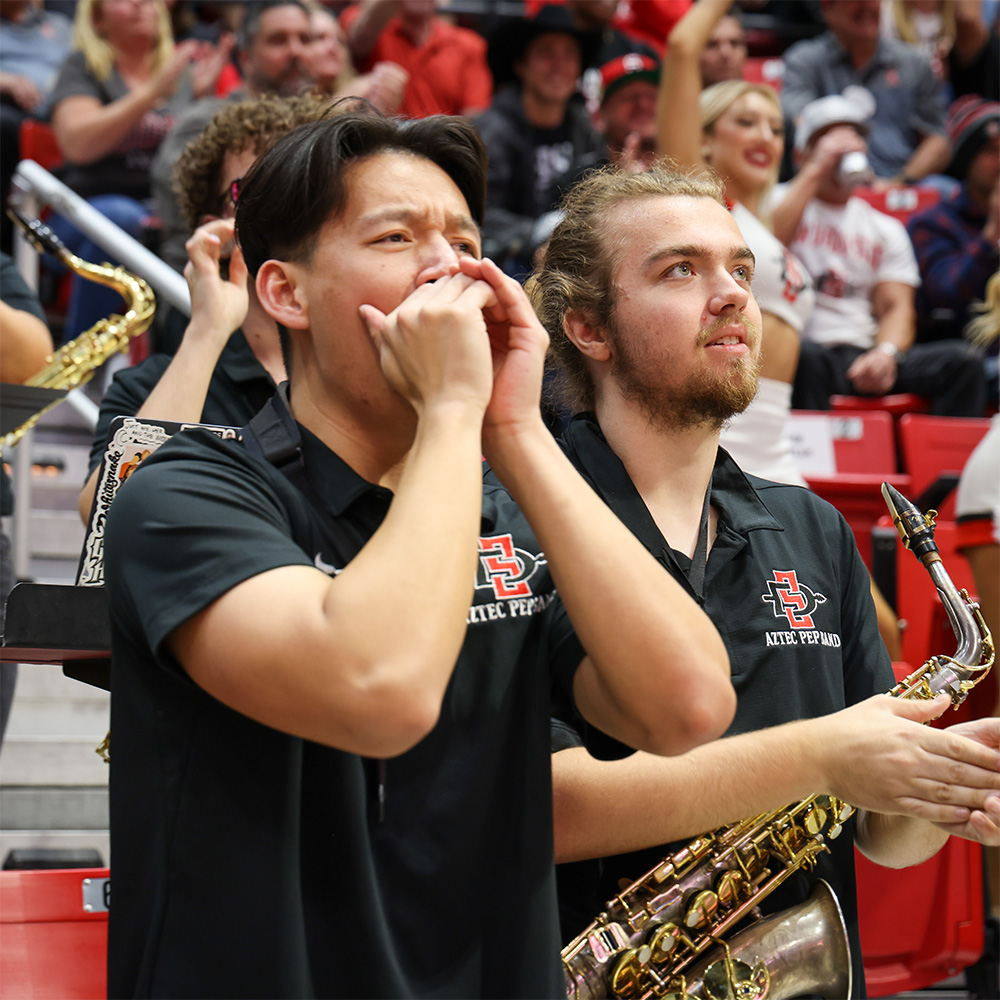 A couple members of the Aztecs Pep Band.