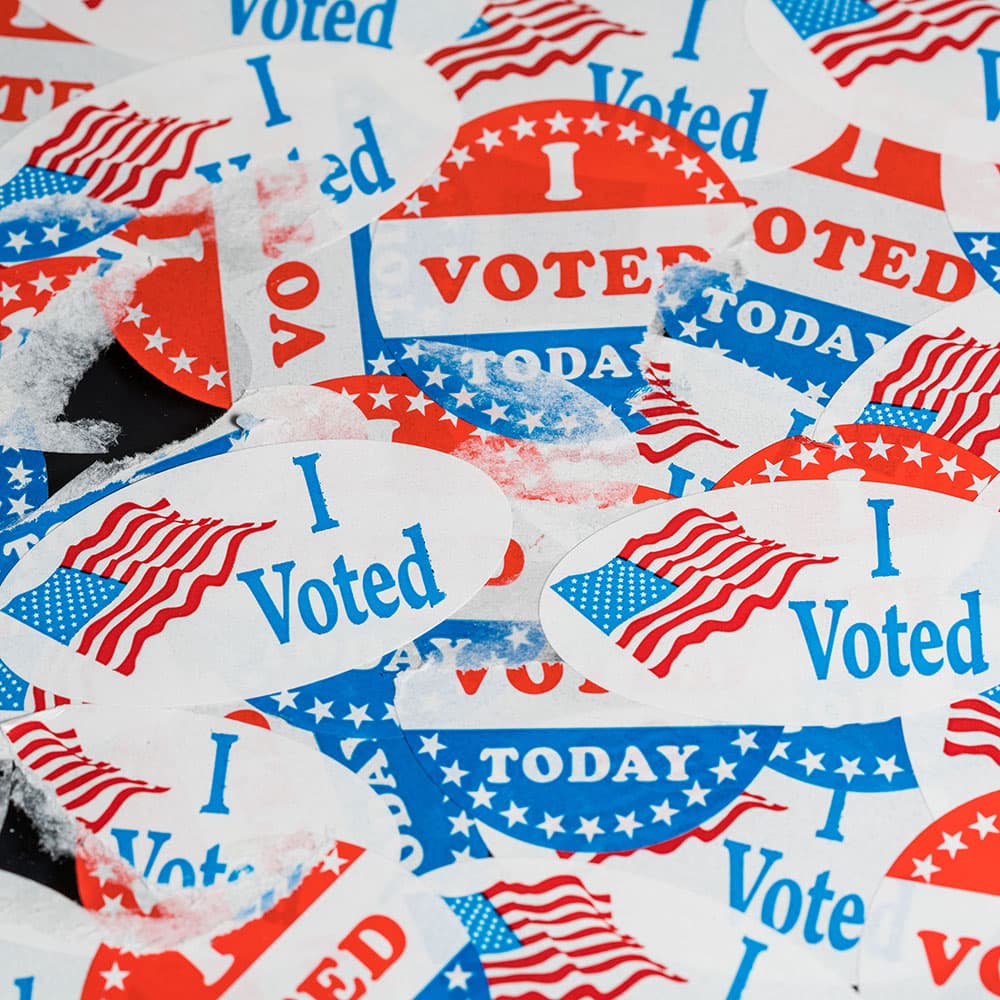 Different styles of 'I Voted' stickers.