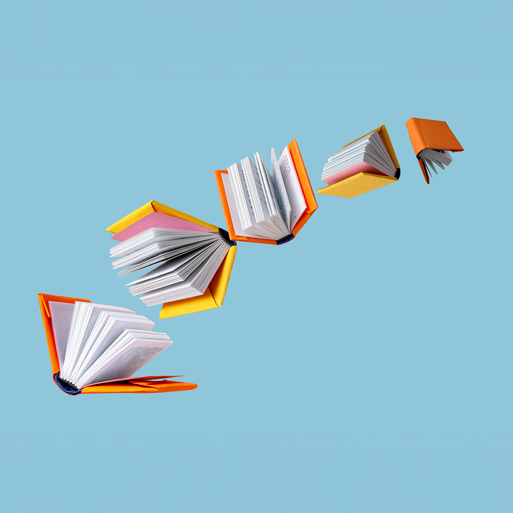 Books flying through the air.