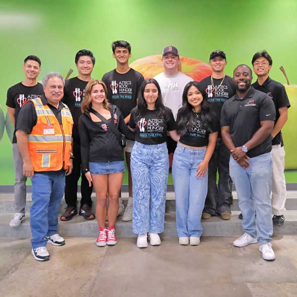 A group photo of ARH members at the San Diego Food Pantry warehouse
