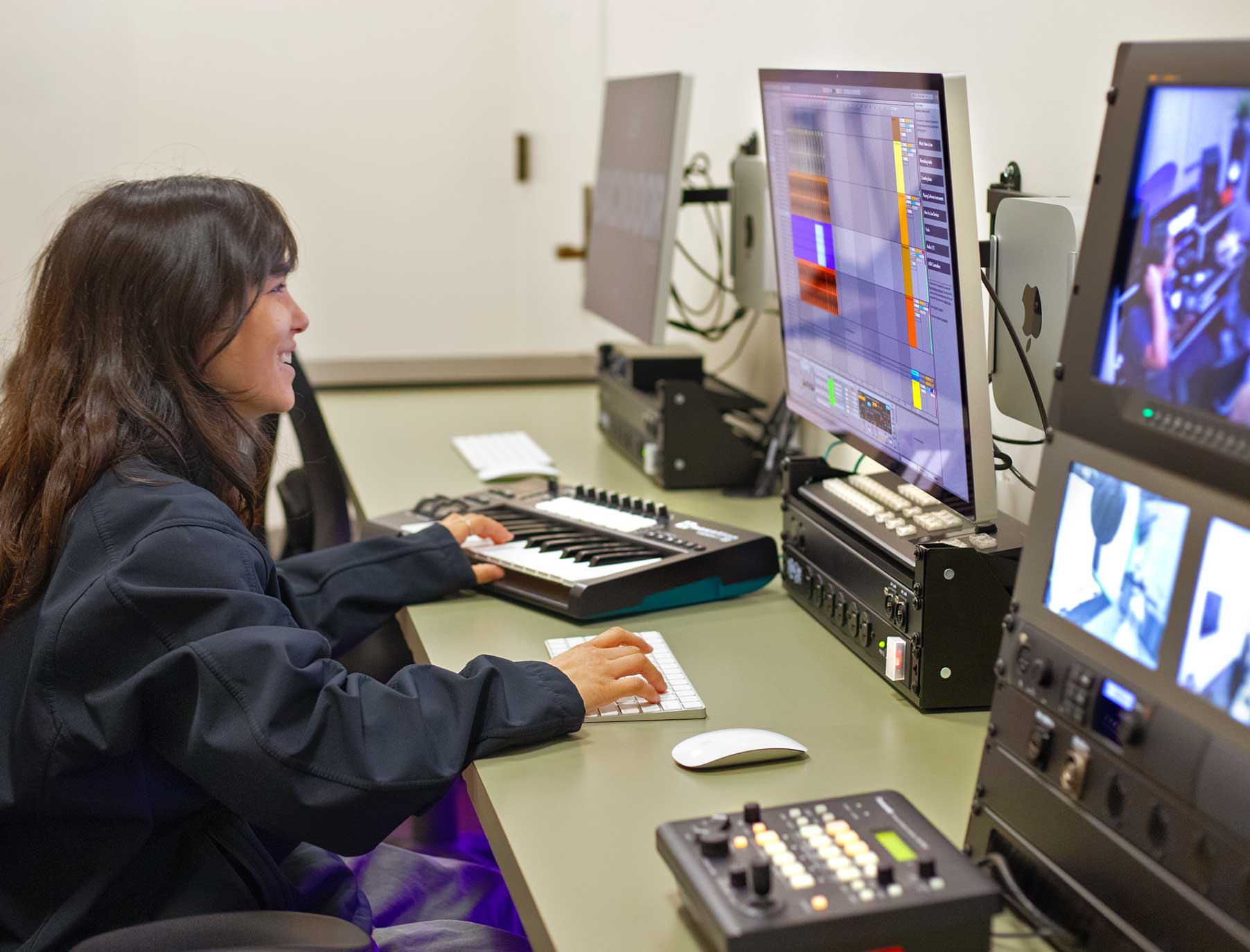 Student Utilizing the Editing Bay