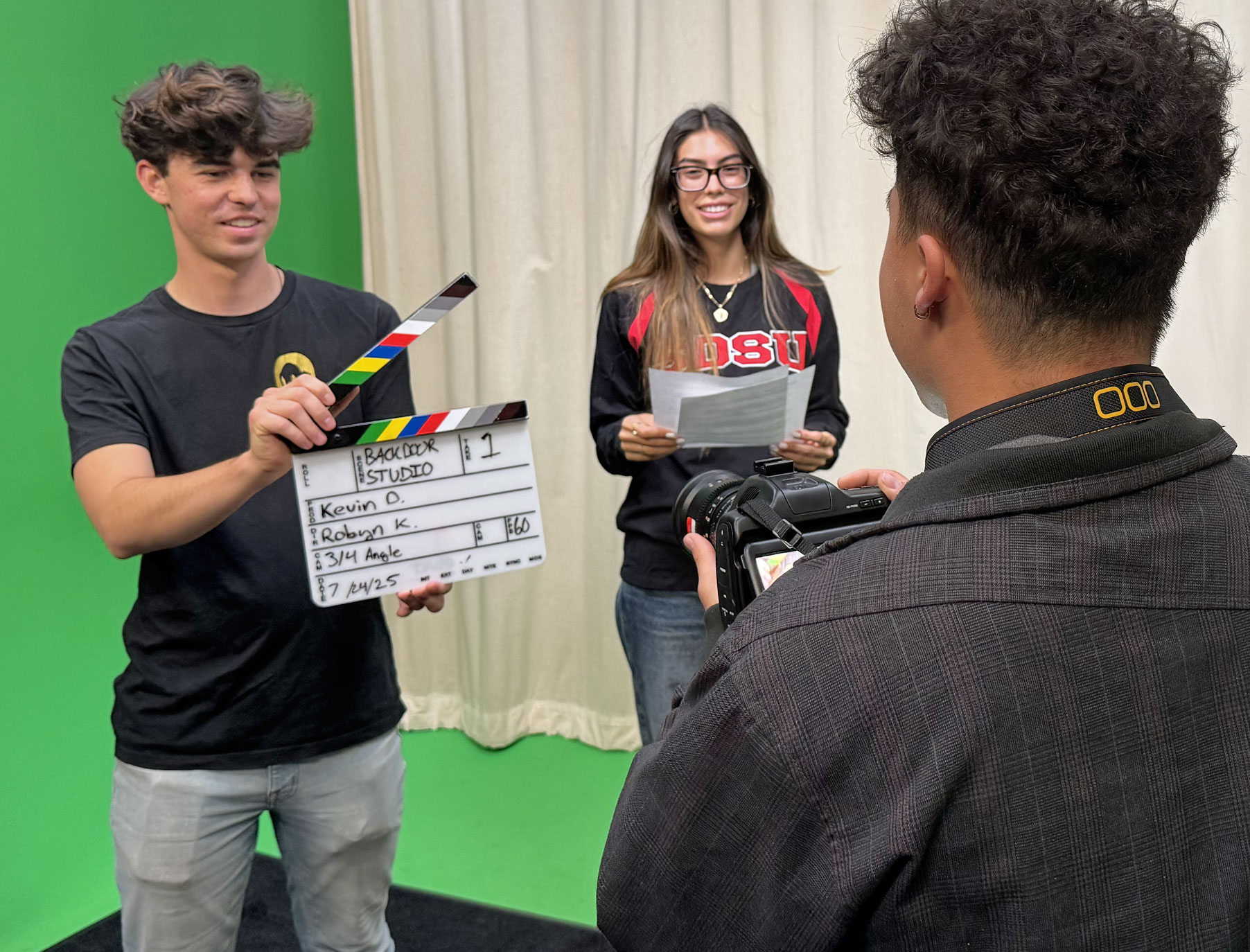 Students video recording a speech